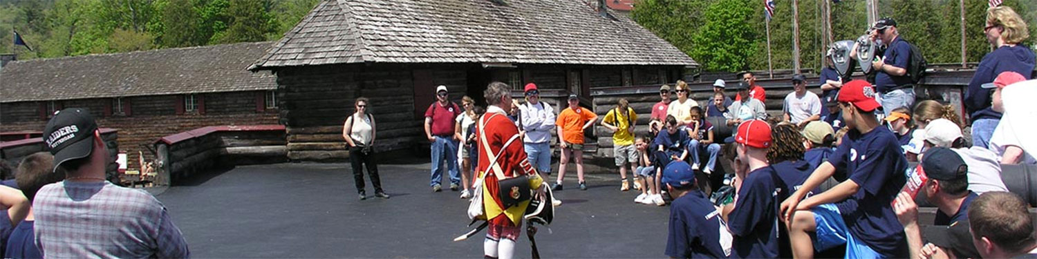 Volunteers talking to a group at Fort William Henry in Lake George, NY